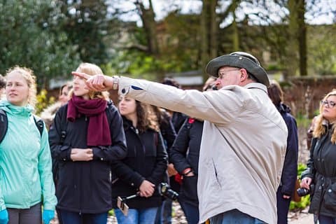 Showing a group around King's Manor