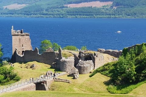 Urquhart castle on the banks of lochness you will have time here to go and walk round the ruins if you wish