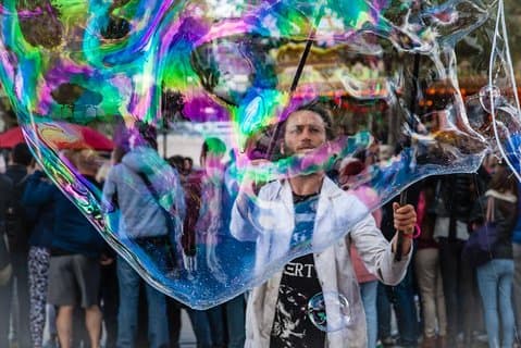 Photograph Colourful Street Entertainers