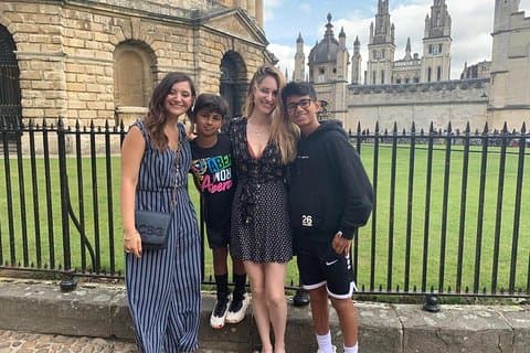 These travellers outside the unique Radcliffe Camera building.