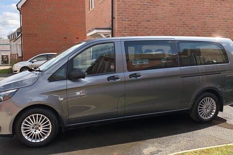 Side of view of the Mercedes 9 seater Vito
