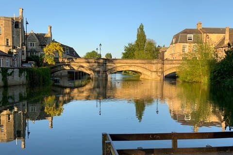 The Stamford bridge and river well and in the evening sunlight.