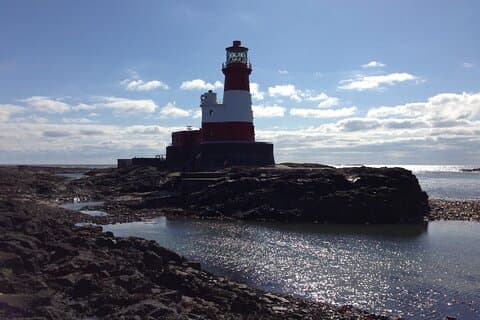 Unique aspect of Longstone Lighthouse from 'The Humber'. Our son clambered over a few years ago when the tide was so far out you could walk to it.