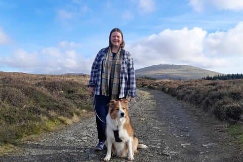 Louise with the Border Collie Max in the uplands