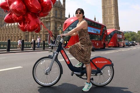 Photo on Westminster bridge with iconic red bus in the background