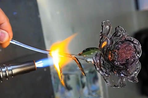 Creative lampwork glass flower sculpture. Perfect piece for home decor and gifts.