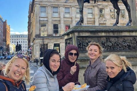 Food Tour guests enjoying some local street food