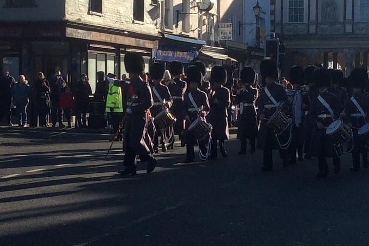 Guards march by in Windsor old town