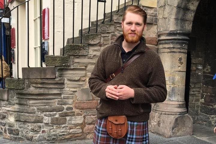 Josh the guide, in his Kilt, outside Gladstone's Land