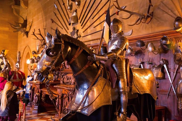 Medieval armor and weapons on display inside Warwick Castle