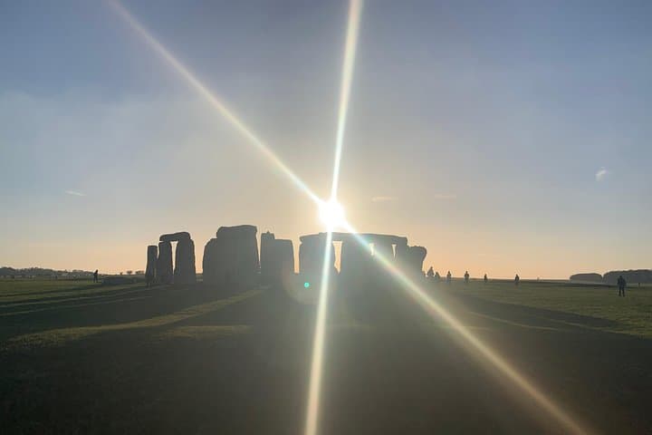 The sun shining over Stonehenge is a truly magnificent view