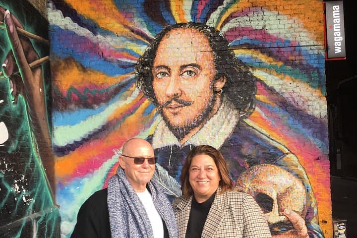 Posing with Shakespeare artwork in Old Southwark