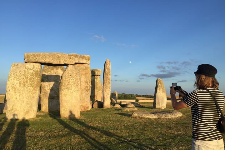 Taking a picture at Stonehenge before the large crowds arrive