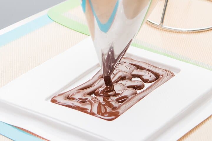 Pour melted chocolate and make your dream chocolate bar