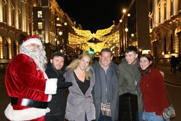 Santa Claus with our guests on Oxford Street - which has had Christmas Lights since 1959.