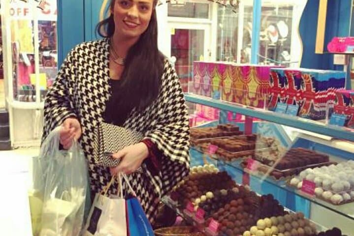 Customer buying truffles at discount on our tour.
