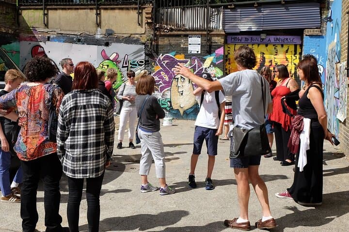 Guide Dave discusses semi permissioned murals near Brick Lane