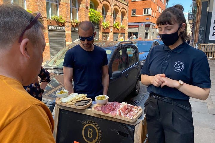 Charlotte talking us through our local cheese and meat platter.