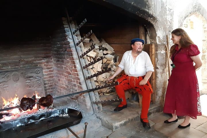 Chatting with one of the historical cook in the Tudor Kitchen