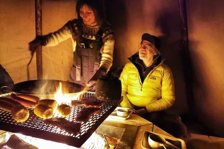 Dinner in the lavvu next to beautiful Mattarahkka NorthernLights Lodge