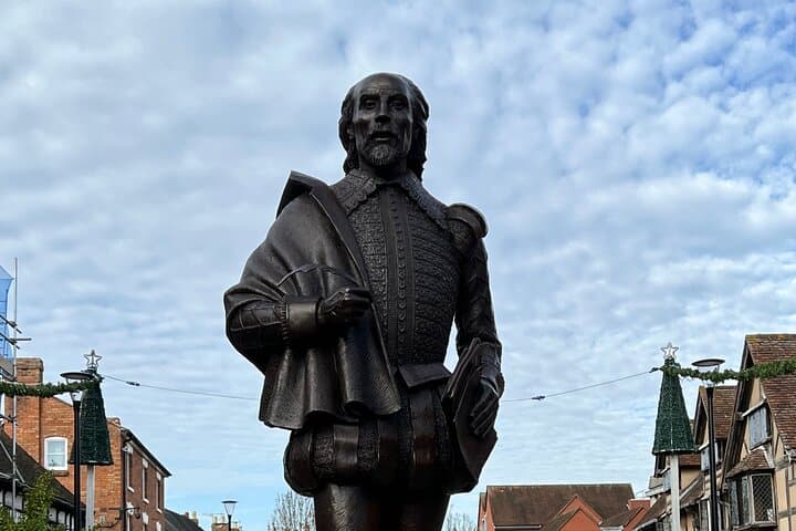 The great poet himself outside his home