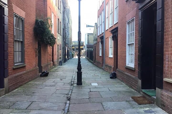 Atmospheric streets with Dickensian alms houses