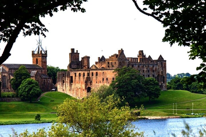 Linlithgow Palace reflected in its peaceful loch.