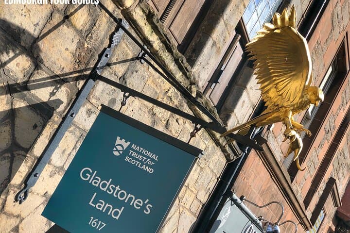 Remember to look up! Red Kite and Rat above the entrance to Gladstone's Land.