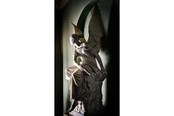 An angel contemplating the grounds