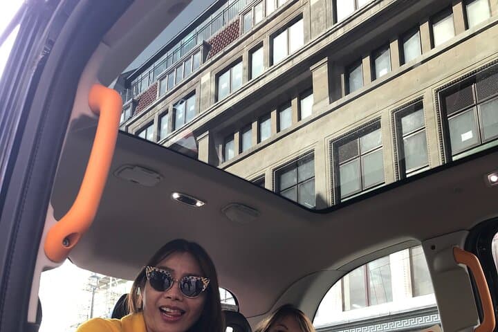 Huge panoramic windows all around in London Electric Taxi