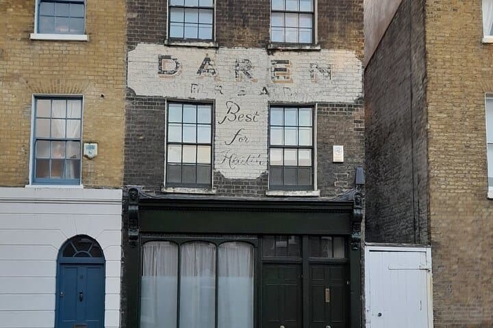 A ghost sign telling the story of bread's benefits