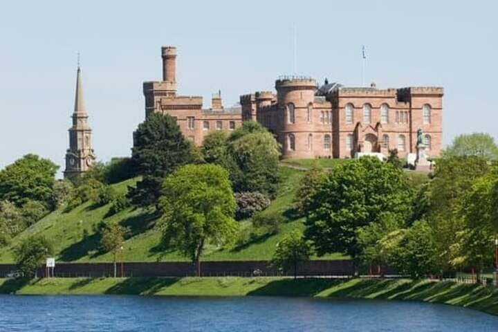 Enjoy a photo stop at Inverness Castle — a Highland landmark with stunning river views.