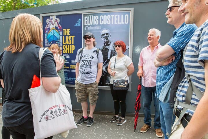Tour guide, Alison, with guests on the Music Mile Tour