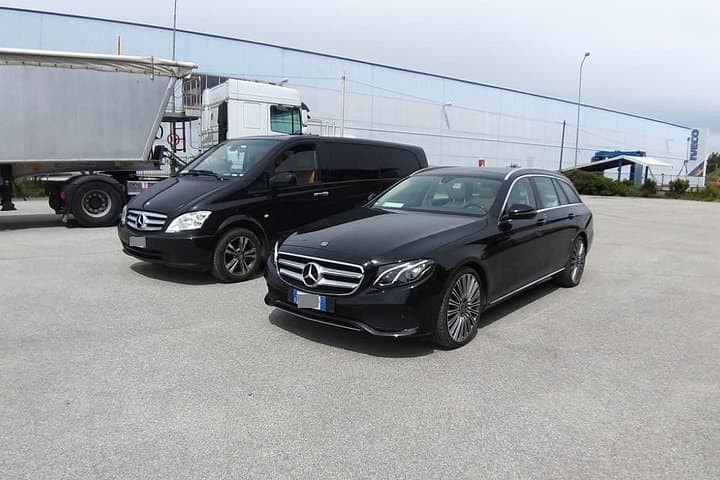 Manchester Airport (MAN) to Manchester - Round-Trip Private Transfer
