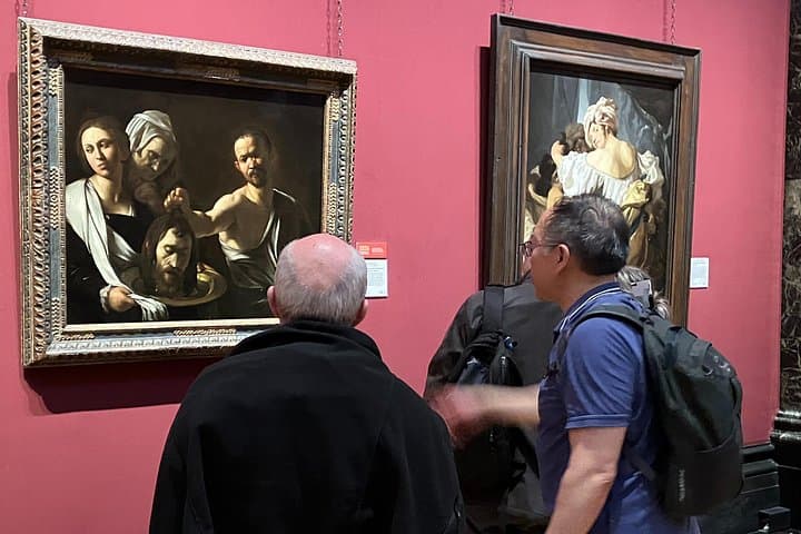 Examining the head of John the Baptist being put on a sliver platter as described in Mark 6. Caravaggio oddly depicts a matter-of-fact executioner and a repulsed Salome.