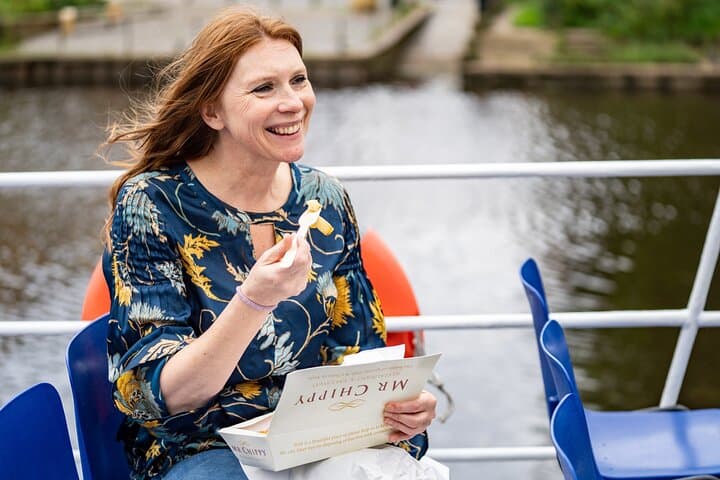 A delicious catch on deck - crispy fish and golden chips under the sun!