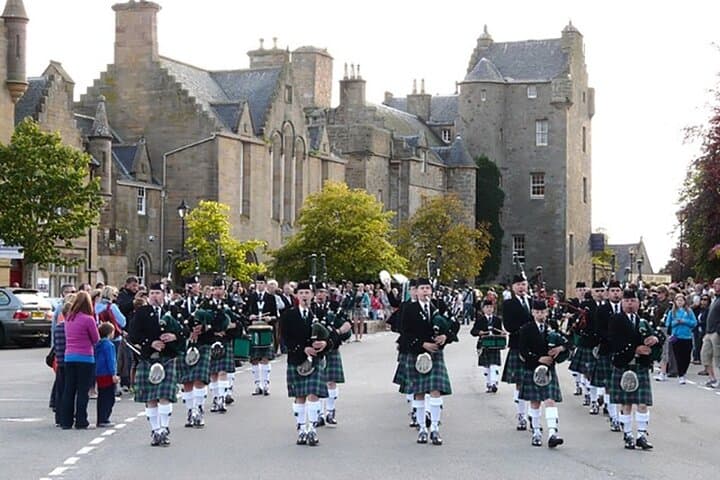 Dornoch with Pipe Band in Town Square