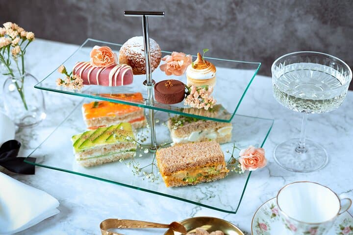 London Afternoon Tea Experience Aboard a Glass-Roofed Bus