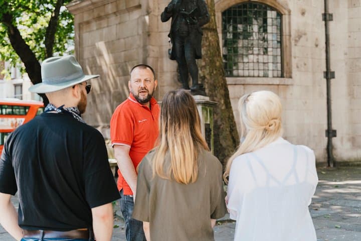 Outside St. Clement Danes, viewing bomb damage from the Blitz