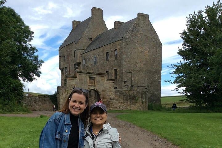 Outside Midhope Castle with guests