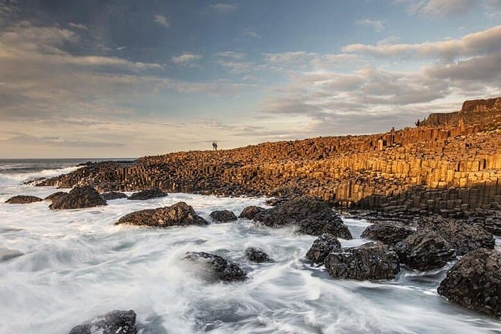 Breathe the fresh morning air at UNESCO Giant's Causeway, Northern Ireland's only World Heritage Site
