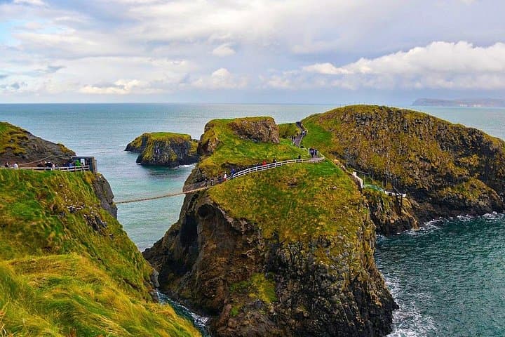 Take spectacular photos of Carrick-a-Rede Rope Bridge and the Scottish coast at Portaneevy
