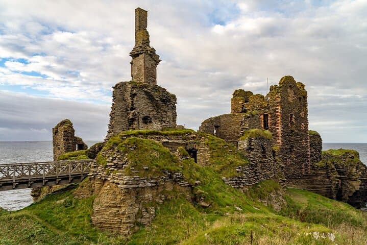 Visit the ruined Castle Sinclaire on the North Coast 500