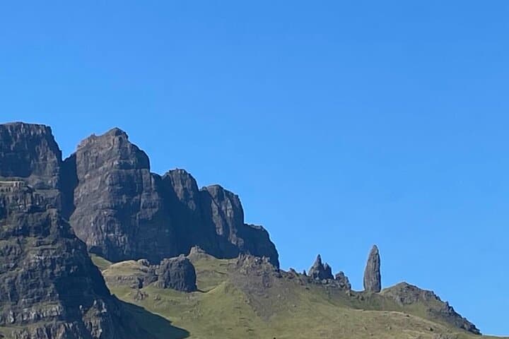 See the towering rock formation of the Old Man of Storr — a must-see on every Skye adventure.