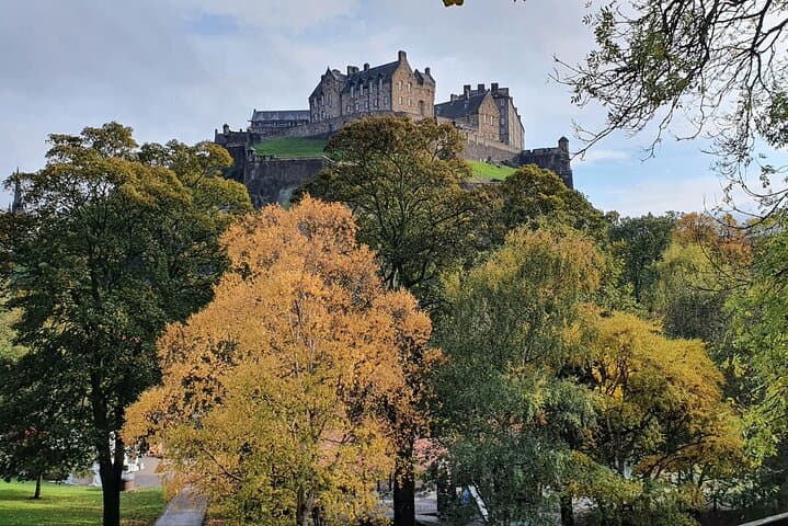 Edinburgh Castle in Autumn as seen from Princes St Gardens (West)