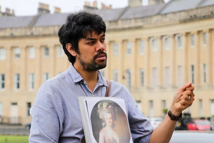Tour guide discussing the history of Bath in the Royal Crescent