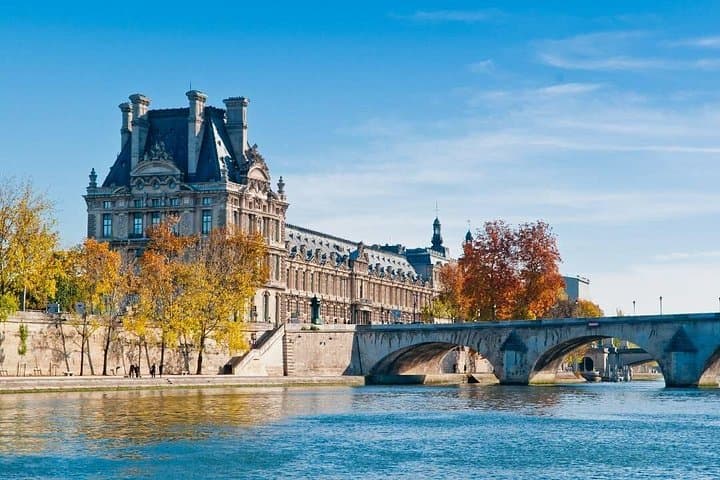 Escorted Paris Day Trip: Eiffel Tower, Notre Dame & Lunch Cruise