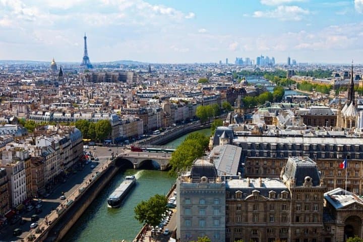 Escorted Paris Day Trip: Eiffel Tower, Notre Dame & Lunch Cruise