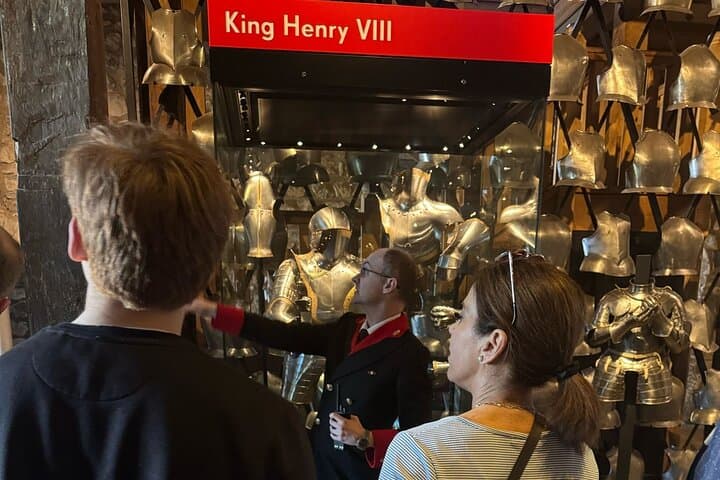 White Tower Warden and tour guests inside the White Tower