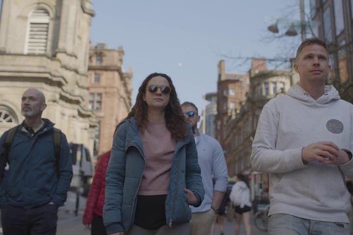 Gallus Pedals Glasgow Walking Tour guests wandering through the city streets